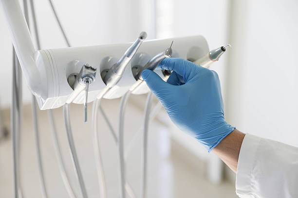 Professional Tooth Extraction technician working in Warsaw, IL